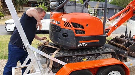 how to tie down a mini excavator|adelaide mini excavator strapping instructions.